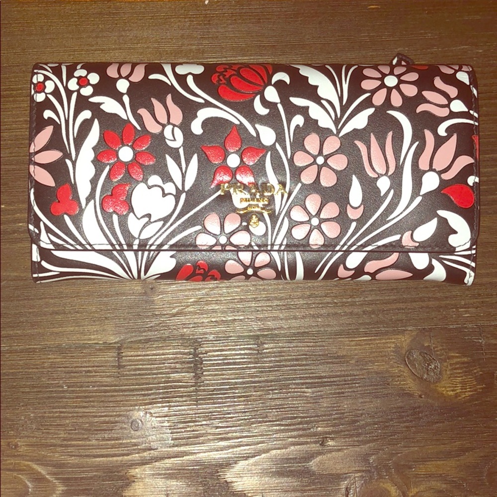 Brand new never used Prada Milano clutch.